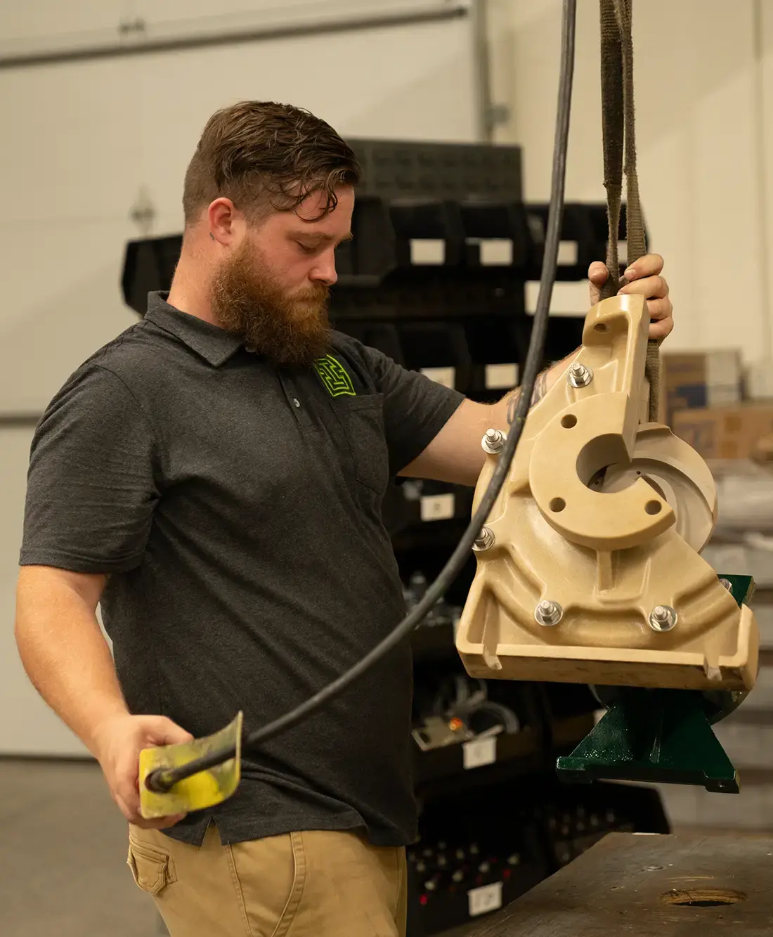 IPEC technician working on Fybroc industrial pump